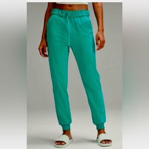 Lululemon Kelly Green Ruffled Waist Stretch, High-Rise Jogger Pant, Size 8